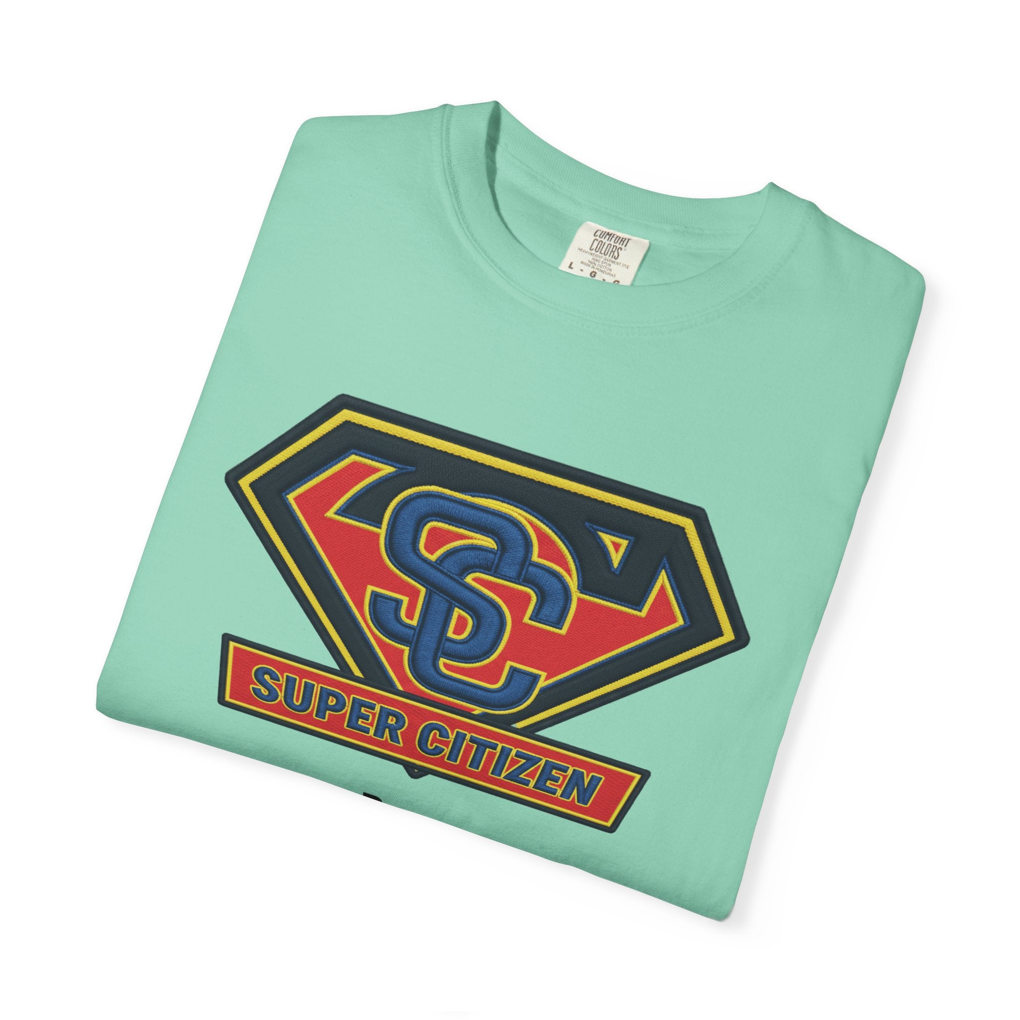 Super Citizen Graphic T-Shirt — "Pays so many taxes" (Black text) - A protest tee for everyday people. Regular citizens pay taxes at every step of life—income, purchases, property—while the burden...